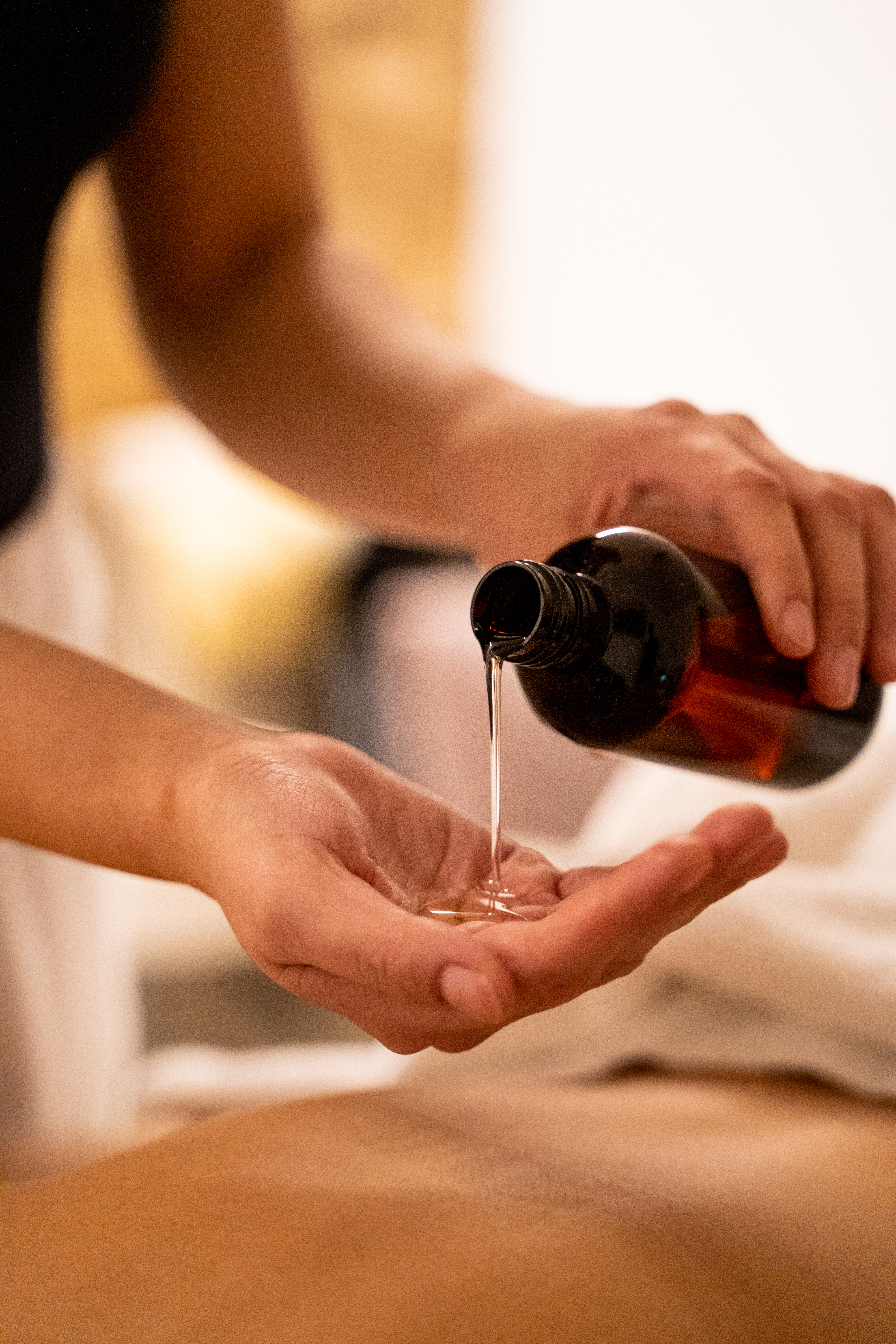 Therapist performing a Thai combination massage at Thai Bualuang in Maldon, Essex