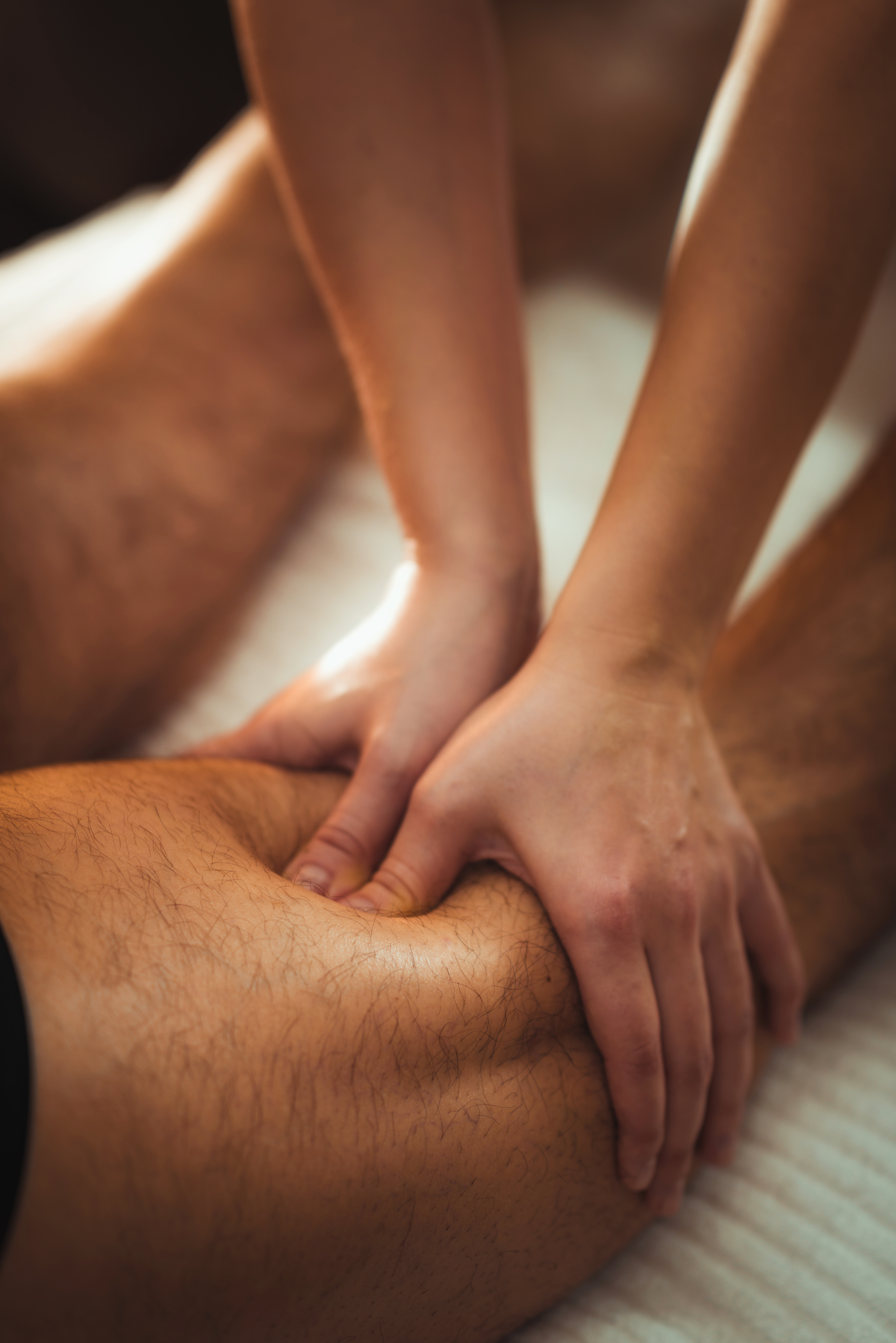 Therapist performing a deep tissue massage at Thai Bualuang in Maldon, Essex